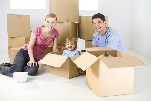 Preparing boxes and furniture for a moving truck in Old Ford