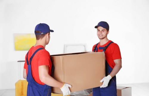 Loading household items for a move near Old Ford streets