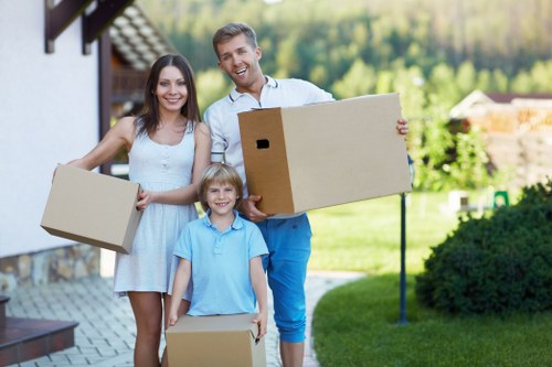 Loading furniture into a moving van for an Old Ford relocation