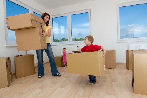 Packed business equipment and office furniture ready for transport