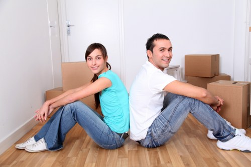 Packed boxes and furniture ready for house removals in Old Ford