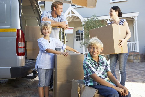 Careful loading of household items for an Old Ford move