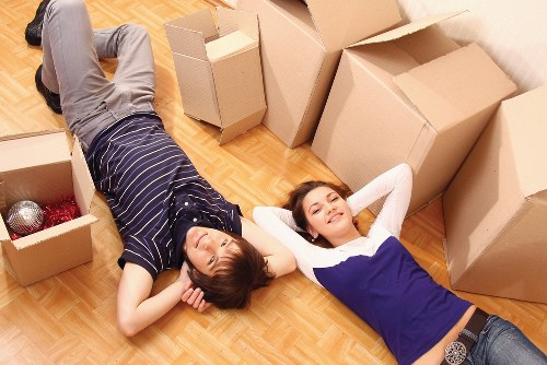 Commercial furniture and boxes being loaded for an office relocation in Old Ford