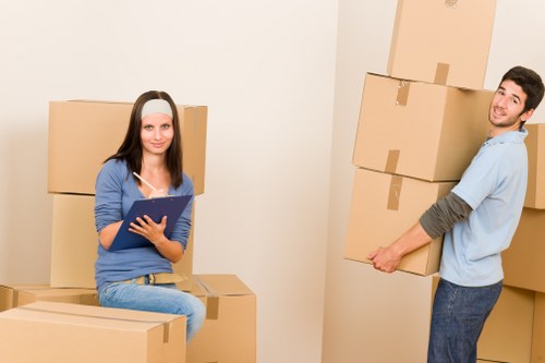 Furniture being moved from a flat with stairs in Old Ford