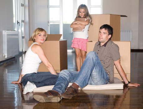 Packed boxes and furniture ready for transport in East London